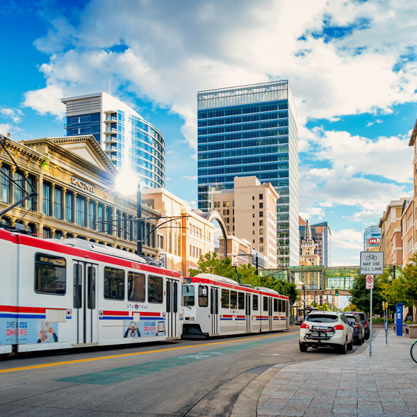 Downtown Salt Lake City's beautiful skyline with ample public transportation like UTA's Trax Lightrail line